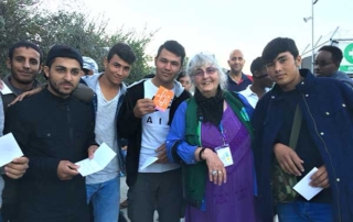 Valerie with Refugees