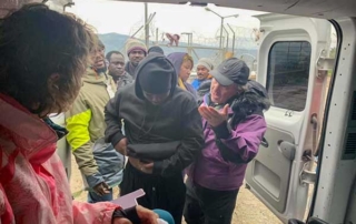 Dr. Mark attending to refugees.